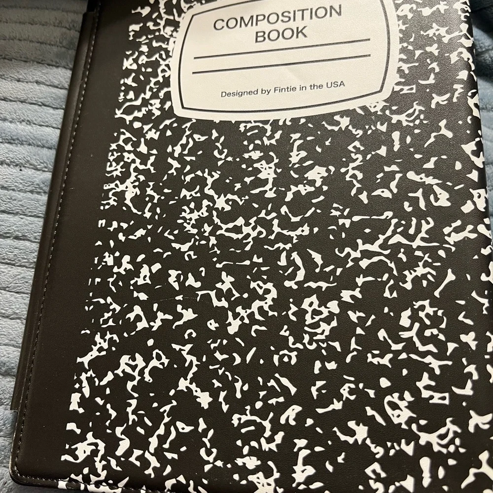 Ten inch composition note book tablet cover.